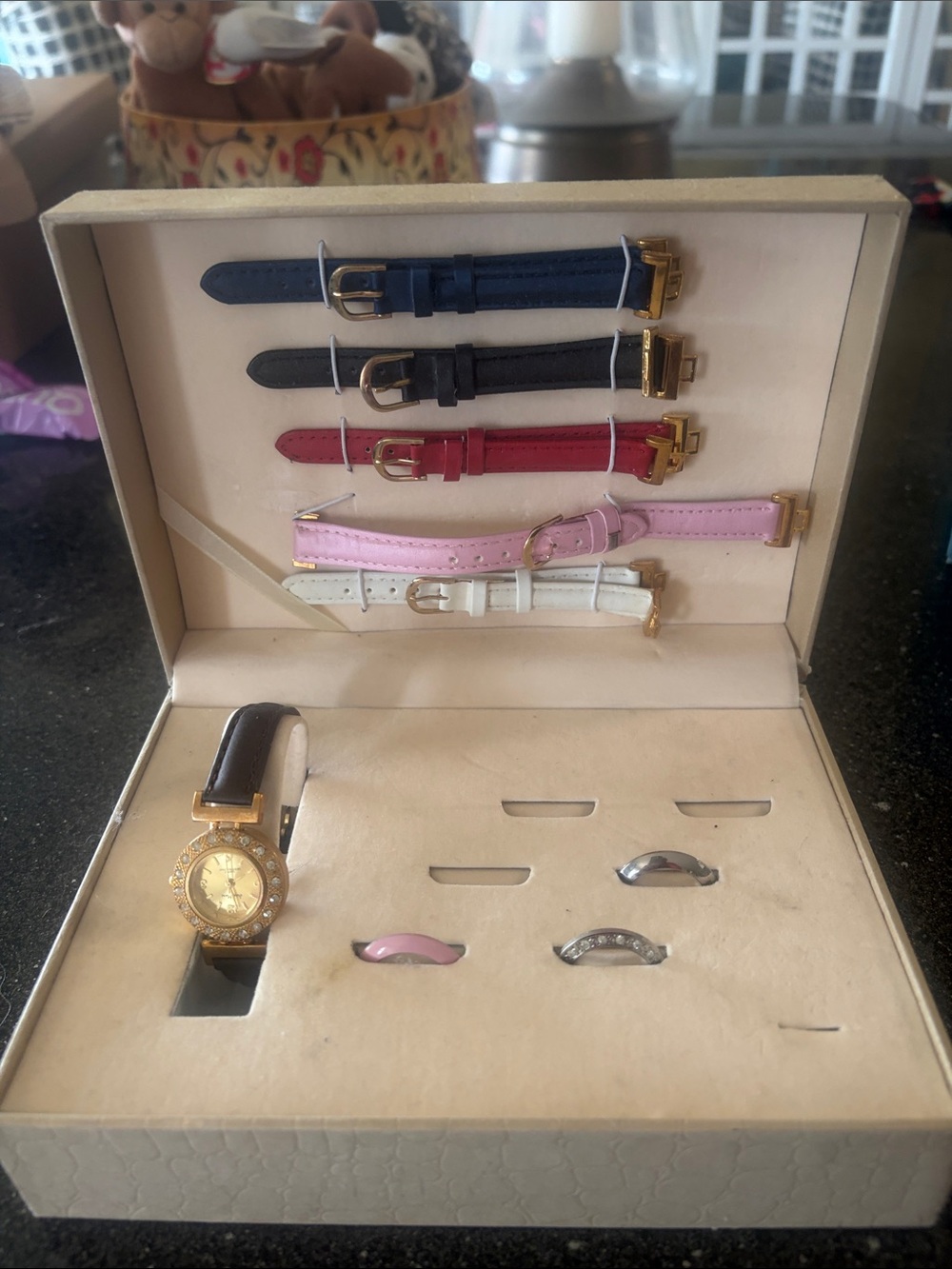 Watch with five different colored bands
